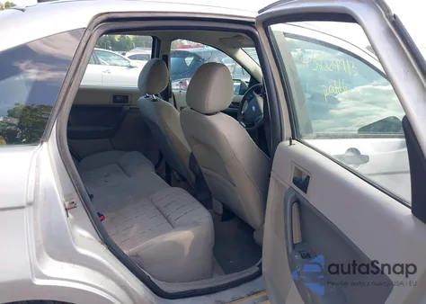 2009 Ford Focus Se z USA, uszkodzony, nr VIN 1FAHP35N39W142556